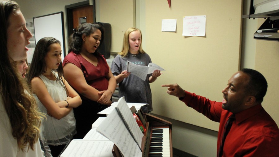 Students showcase their singing voices with Dennis Whitehead for the first part of their audition. All auditionees sang together to test their harmonies, and some were asked to do solos for further evaluation.