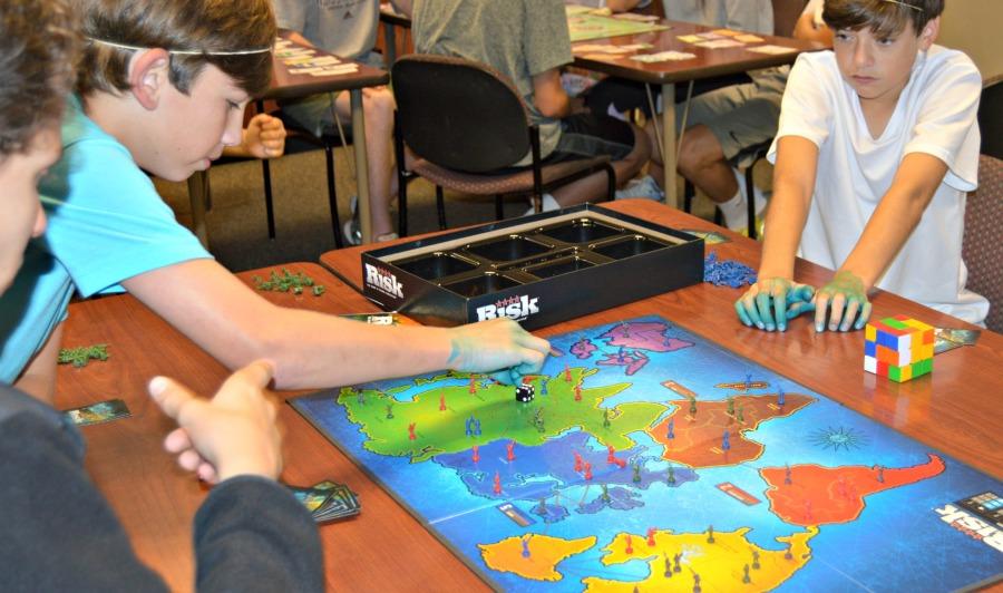 Students+strategize+while+playing+Risk+on+the+half-day+before+Fall+Break.+On+the+half-day%2C+students+participated+in+two+sessions+of+classes+based+on+their+interests.