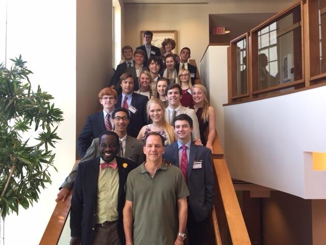 Students and Mr. Mercer with philanthropist Mr. Paul Tudor Jones at Tudor  Investment Corporation headquarters.  Jones founded the corporation in 1980 as well as the Robin Hood Foundation.