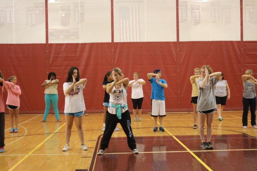 Students in the dancing class learn new hip-hop moves.