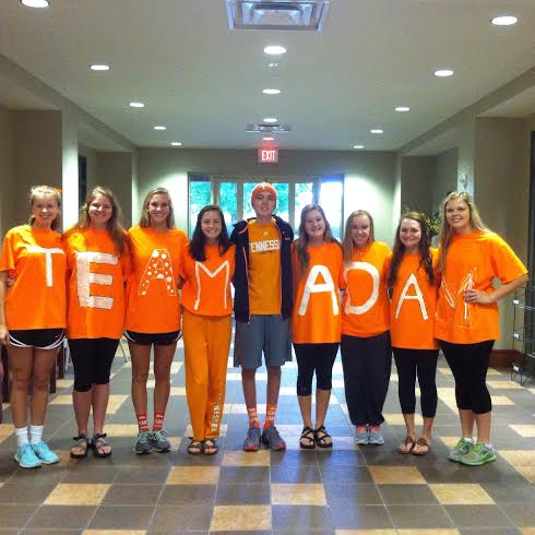 Students wear Team Adam shirts in support of him.