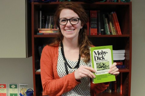 Dr. Robertson holds up one of her favorite books. Her top five favorite books included Moby Dick, Pride and Prejudice, Jane Eyre, Three Men in a Boat to Say Nothing of the Dog, and Bleak House.