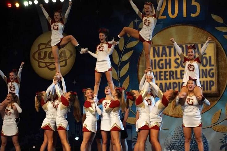The+competitive+cheerleading+team+perform+a+stunt-filled+routine+at+Nationals+in+Orlando.+The+cheerleaders+proceeded+to+the+semi-finals+for+the+first+time+in+school+history.