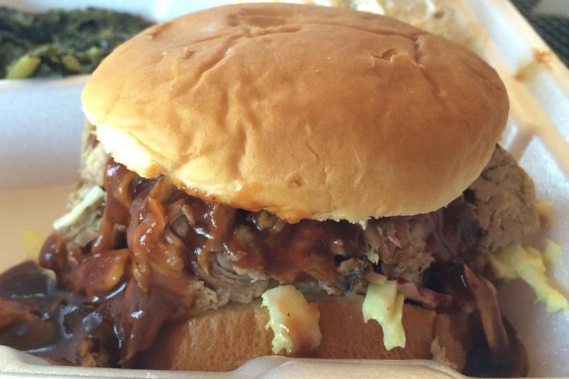 Newsies try a pulled pork sandwich with coleslaw and barbecue sauce. Tom’s barbecue was featured on Food Network.