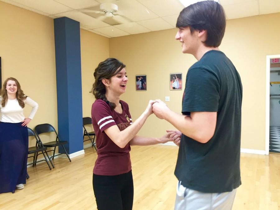 Connor Funck ’16 and Annie Vento ’17 prepare to swing dance at Blue Suede Ballroom. At the practice, the instructor, Jonathan, taught the “neutral stance,” how to turn and how to swing your partner or be swung.