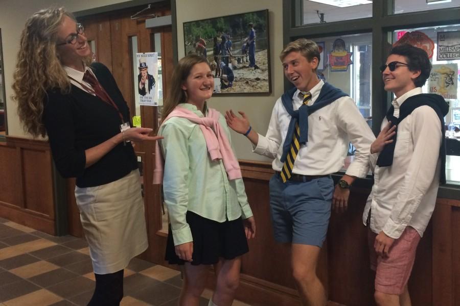 Dean of Students Mrs. Kalyn Underwood and seniors Claire Thomas, Jared Whitaker and Payton McGough pose in their preppy attire. Tuesdays spirit week theme in the middle school was cancer awareness day and preppy versus jocks in the upper school.