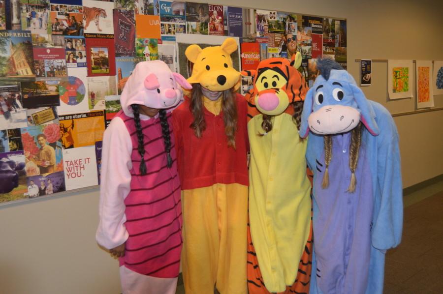 Olivia Barton, Anna Camille Stoddard, Abbie Cloutier and Margo Valadie pose as characters from Winnie the Pooh. Spirit week in the upper school began with group day.