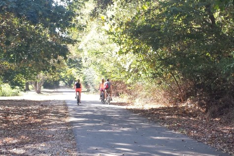 Women ride bikes along the Greenline in Memphis, Tenn. The Greenbelt, a similar trail, could someday come through the St. George’s Collierville Campus.