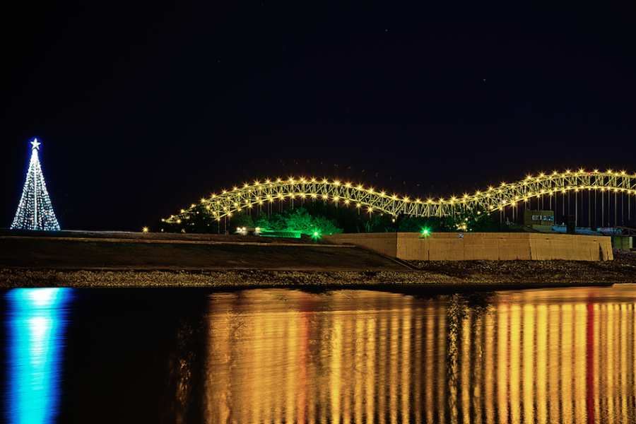 Lights shine down on the Mississippi River during the holidays. Many Christmas events, like Starry Nights, have been around for years.