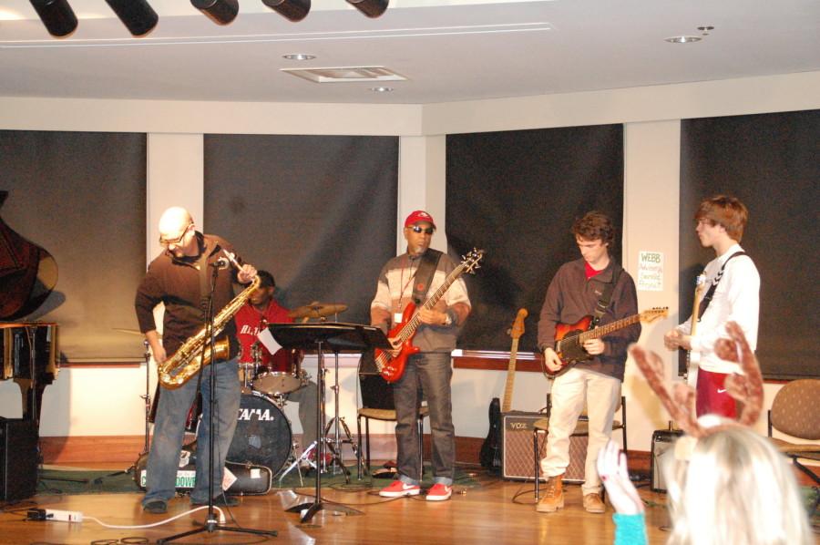 Mr. Andre Miller, middle and upper school art teacher, plays with the Modern Music Assemble. The first St. George’s Coffee Bar was held Friday, Dec. 18th. 
