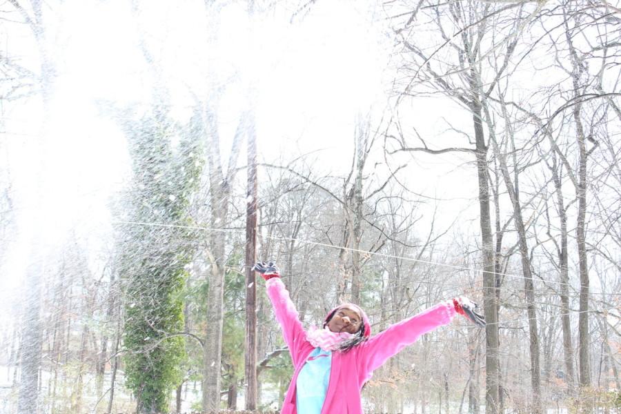 Seventh-grader Joy Huff plays in the snow. Memphis had its first snow day on Friday, Jan. 22, and St. Georges did not have school.