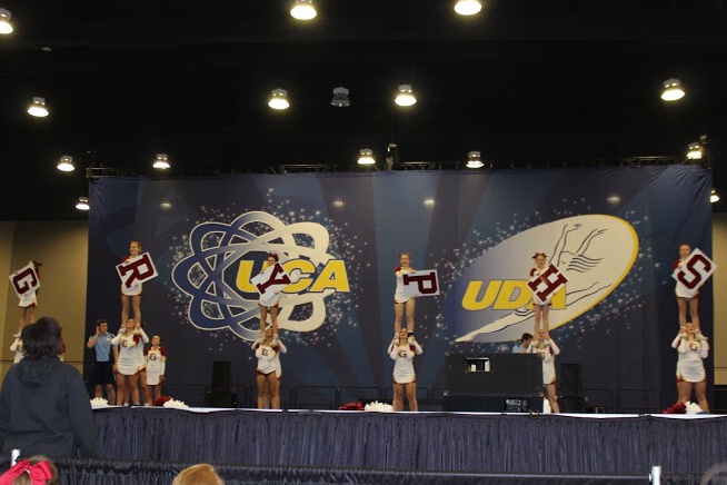 The competitive cheer team performs their routine at regionals. The squad performed at Nationals on Saturday, Feb. 6.