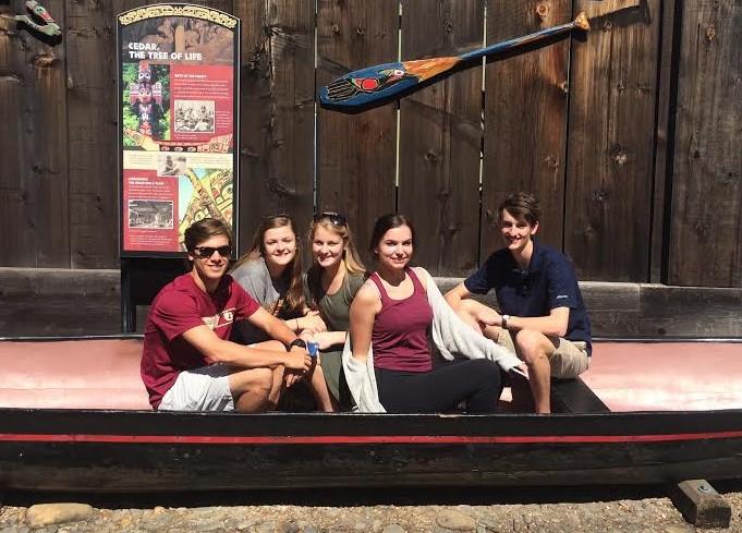Honors biology students (left to right) Graham Sisson, Paige Marotta, Shane Horton, Anna Claire Fox and John Slater Mann spend time in the sun on the trip to the Memphis Zoo on Tuesday, March 15. Both the media marketing and design class and the honors biology class are working on this project.
