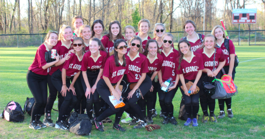 The softball team poses for a picture.  The team beat Rossville 29-7.