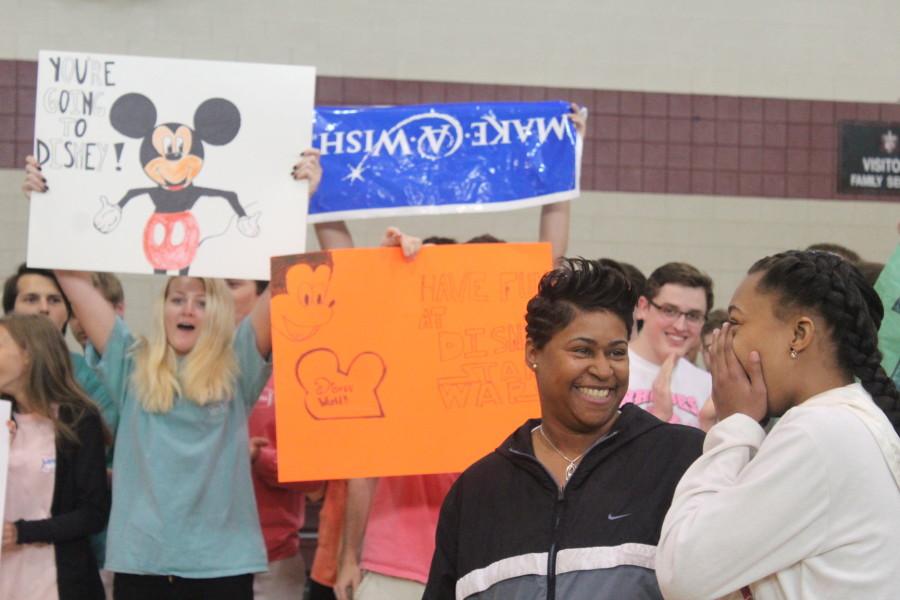 Omya reacts to the news that she is going to Disney World. Omya, whose wish was granted on Friday, poses with her family and St. Georges students after finding out she was going to Disney World. St. Georges granted their 12th wish on Friday, March 18.