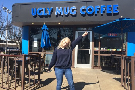 Junior Chloe Booth stands in front of the Ugly  Mug café on Poplar Avenue. Booth and junior Katie Boyle went coffee tasting in Memphis. 