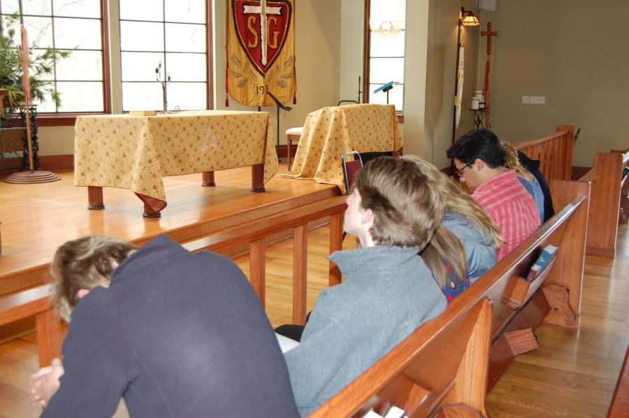 A student looks straight ahead while his peers pray in the Agape Chapel. Alternative chapels were introduced to the St. George’s Upper School in 2006 and have evolved significantly since then.