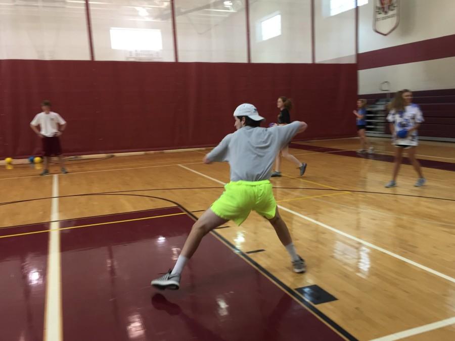 Junior John Carter Hawkins throws the ball during a dodgeball game. He was a member of the team 