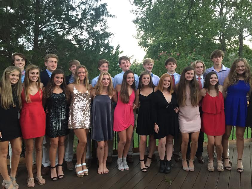 Sophomores pose together for a group photo before Homecoming. The Homecoming dance took place on Sept. 30. 
