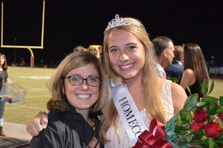 Homecoming+Queen+Avery+Whitehead+poses+with+her+mother.+Whitehead+was+crowned+during+halftime+of+the+football+game.+