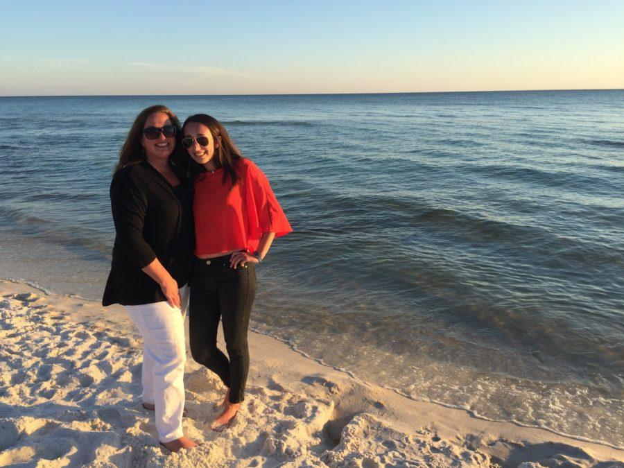 Junior Annie Murff and her mom pose for a photo at Seacrest Beach. While some students stayed in town during the break, others went out of town. 