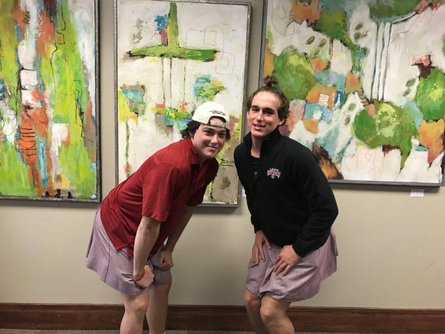 Juniors Met Proctor and Nick Bourdeau dress up as girls by wearing spirit skirts and girls soccer jackets. Students showed their Halloween spirit by wearing costumes to school on Oct. 31.