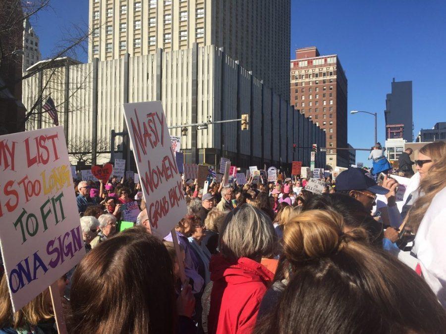 Memphians march down the street in downtown. Over 673 marches took place around the world on Saturday, Jan. 21.