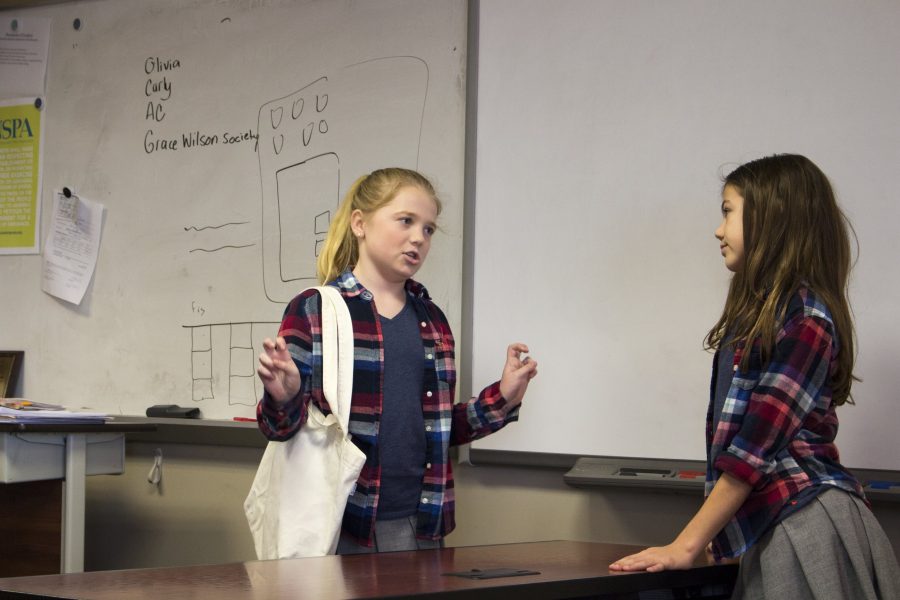 Sixth grade students Mariah Nellessen and Bailey Curran perform their Duet Acting piece. The middle school forensics team won six awards at their last competition. 