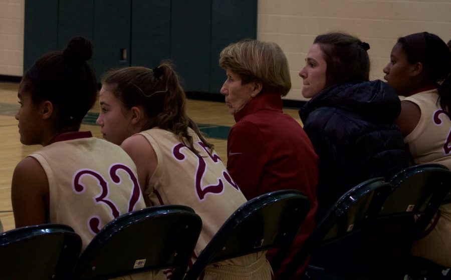 Coach Johns looks on during a St. George’s middle school basketball game. Title IX has increased opportunities for young women to play sports in school.