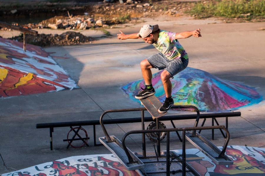 A skater at Altown executes a boardslide in the newly painted park. The locals around Altown enjoyed the change in scenery after Paint Memphis.