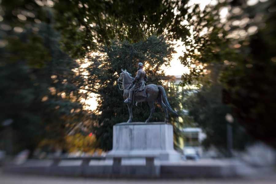 The statue of general Nathan Bedford forrest stands above the burial site of Forrest and his wife. The statue of the confederate general and early member of The Ku Klux Klan was erected in 1905.