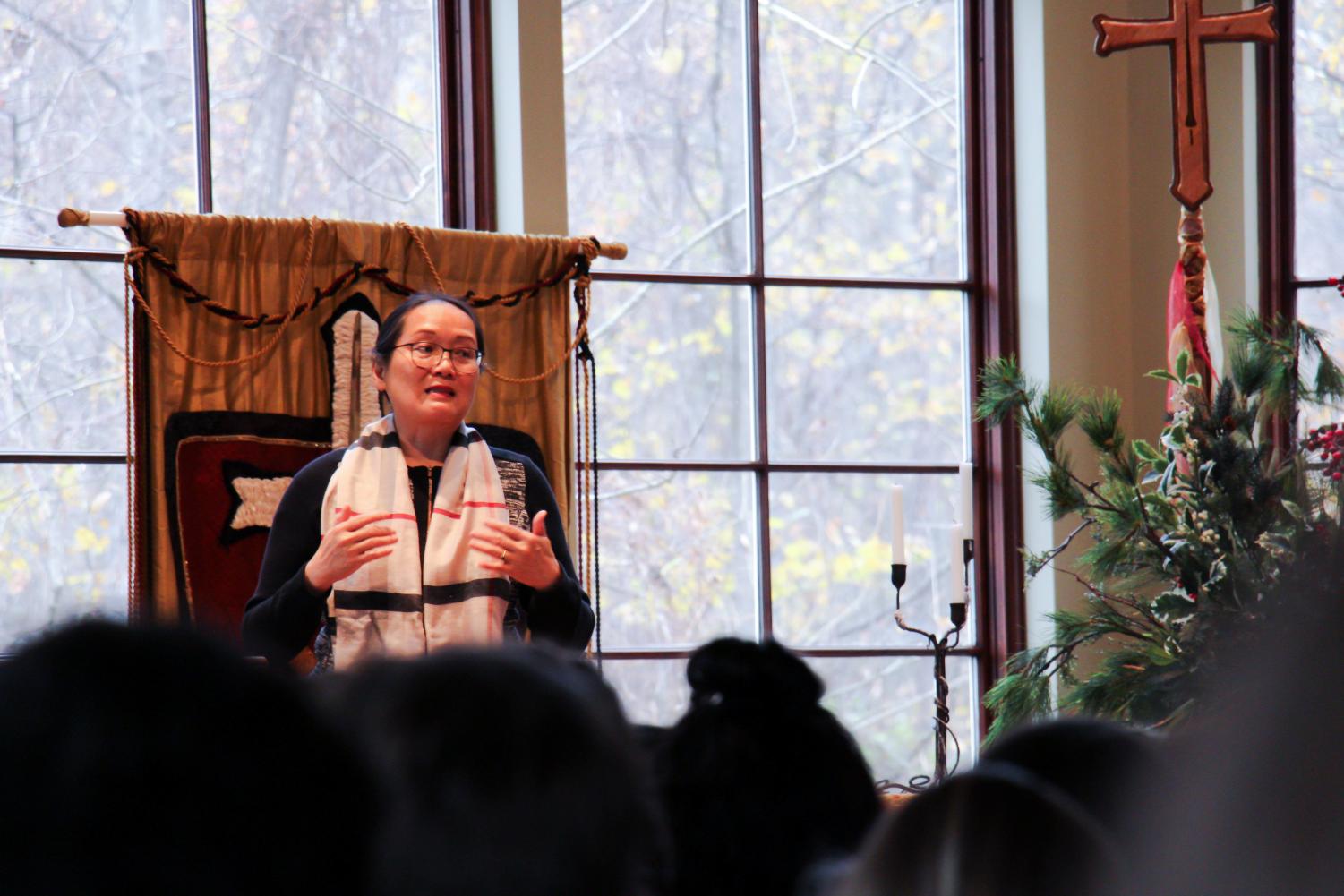 Dr. Jieyong Qian speaks to a group of students in the Agape chapel about her experience with re-education. At the age of sixteen, Dr. Qian was separated from her family and forced into labor with herders.