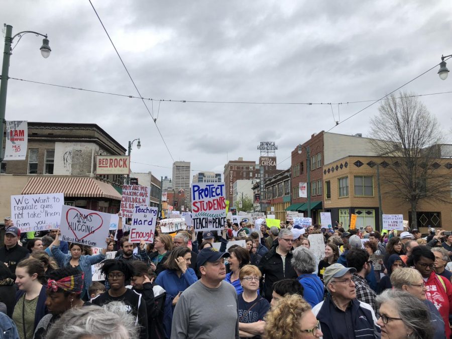 People+hold+up+signs+at+the+March+for+Our+Lives+event+on+March+24%2C+2018+in+Downtown%2C+Memphis.+This+march+was+organized+as+part+of+a+nationwide%2C+student+movement+to+protest+inaction+on+gun+violence+and+safety+within+schools.+