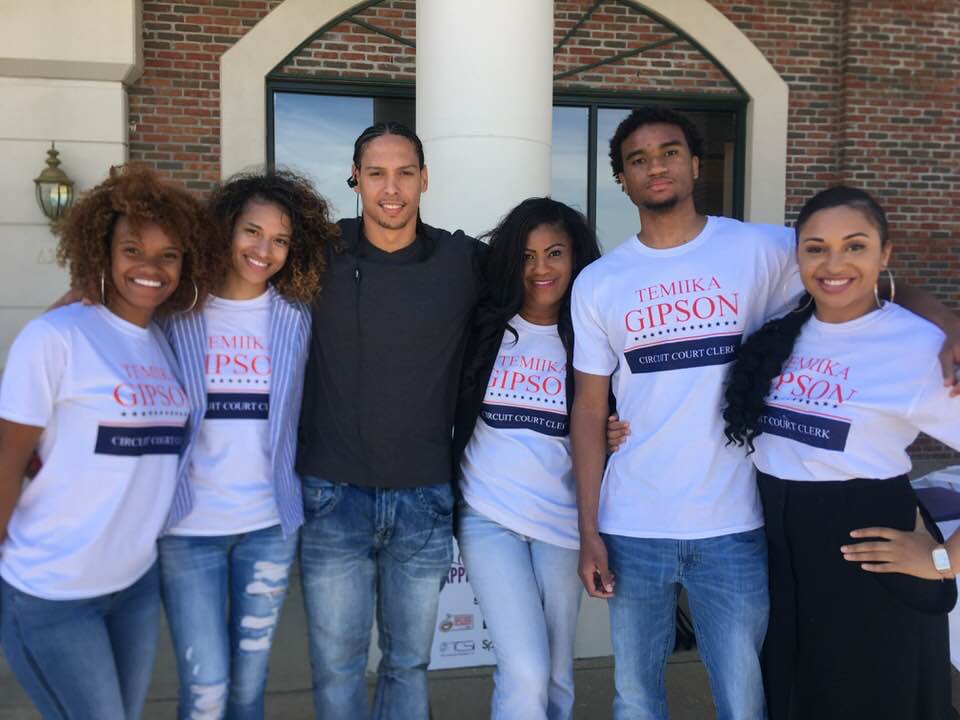 Ms. Temiika Gipson poses with campaign supporters. Ms. Gipson credited part of her campaign success to the many volunteers that helped.
