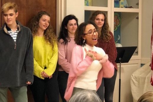 Thandie Boudreaux sings a solo during the groups performance. Maroon 5s She Will Be Loved was the song chosen for the performance on February 15th. Photo Credit: Mrs. Liz Emmendorfer