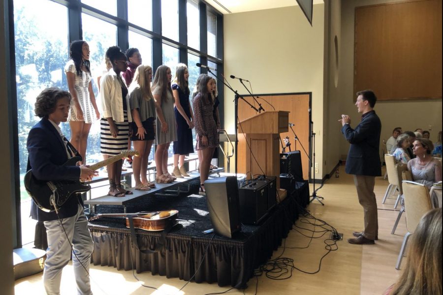 The St. Georges Singers are singing at a luncheon at Temple Israel. They performed Imagine by John Lennon and All You Need Is Love by the Beatles.
