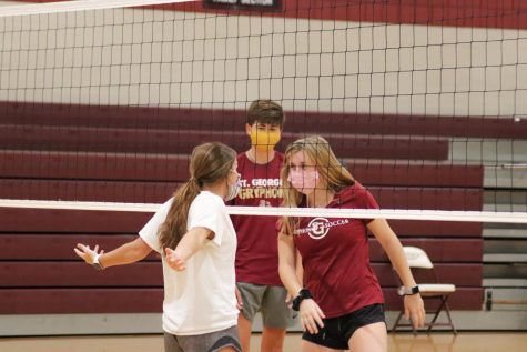 Sophomore Mary Wilkes Dunavant taunts Junior Ally Martin during the St. George's Volleyball House Challenge. The players for the House Challenge, held on the morning of September 4th, consisted of only Freshmen, Sophomores, and Juniors.