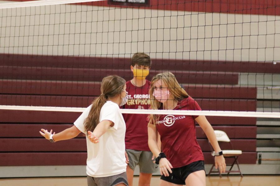 Sophomore Mary Wilkes Dunavant taunts Junior Ally Martin during the St. Georges Volleyball House Challenge. The players for the House Challenge, held on the morning of September 4th, consisted of only Freshmen, Sophomores, and Juniors.
