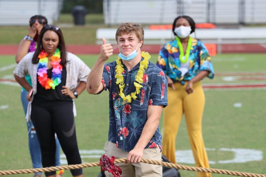 Wes Smith, class of 2021, gives the go ahead for the tug of war game to start. Smith serves as the president of student government.