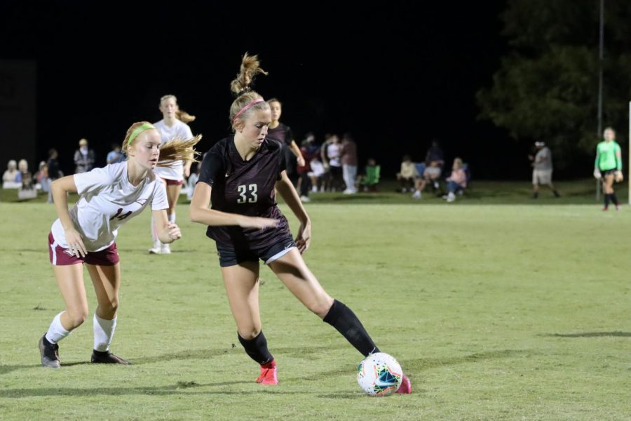 Junior Brenlin Mulaney starts to move ball down the field away to the goal. She scored three goals in total during Region Semi-Final.