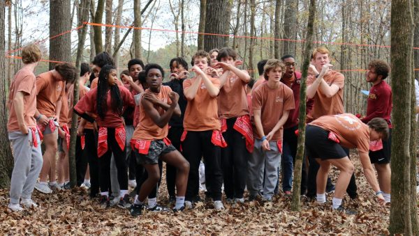 Members of House Cypress pose to show their camaraderie at the November 10, 2023, capture the flag house event on the Collierville Campus. Cypress won the most recent house competition and have been allowed to wear their house shirts on formal dress days during their reign.