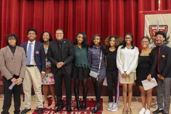 Black student leaders pose with Dr. William Smith, III, guest pastor from Berean Missionary Baptist Church, at the Black History Month chapel on February 20. 