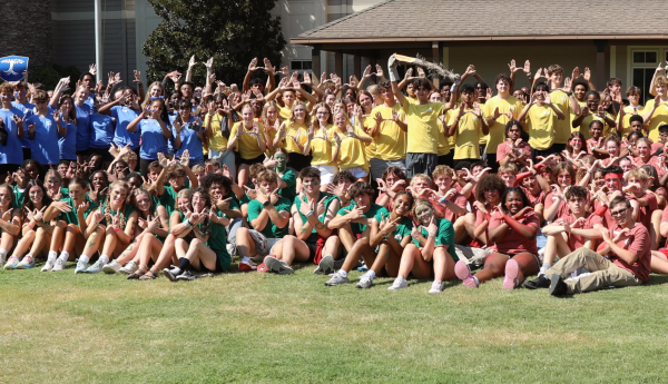 Upper school students stand outside of the school after the first house day of the year on Tuesday, Aug. 20. 