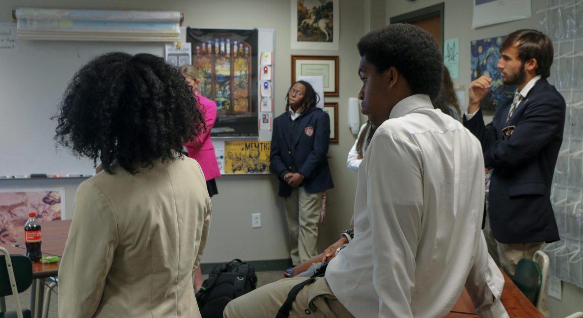 Students participate in a four corners discussion in Mr. Johnson's Holocaust and Human Behavior course on Monday, October 21, 2024.