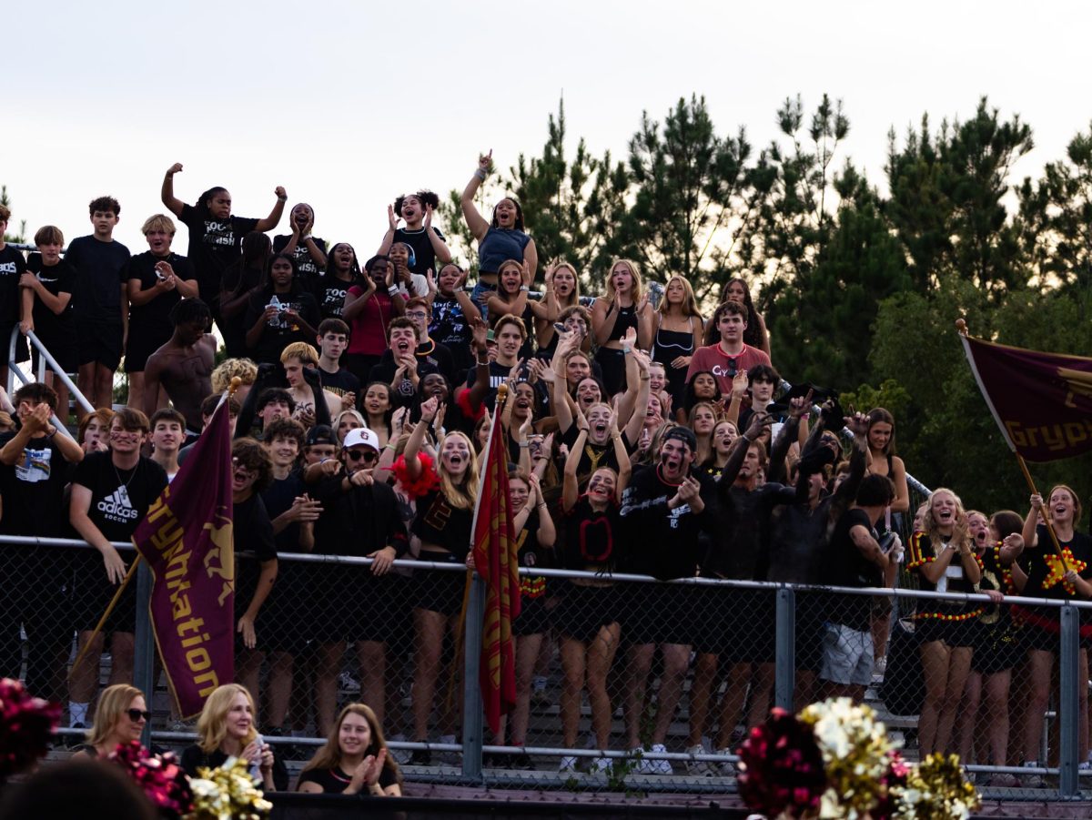The Gryphon student section cheers during the home football game against Harding on Friday, Aug. 29, at Ferguson Field.