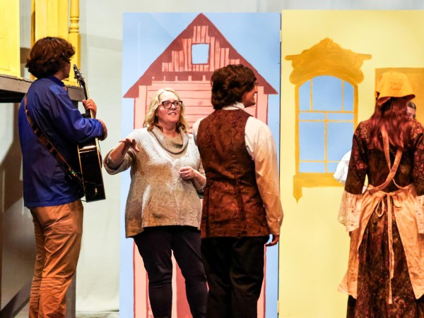 Ms. Bugg directs students at "Fools" rehearsal. "Fools" was the first St. George's play directed by Ms. Bugg and played from Nov. 14-16 at the Lower School Campus. (Photo by Evan Asbell)
